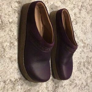 Stegmann woman’s leather cork clogs.